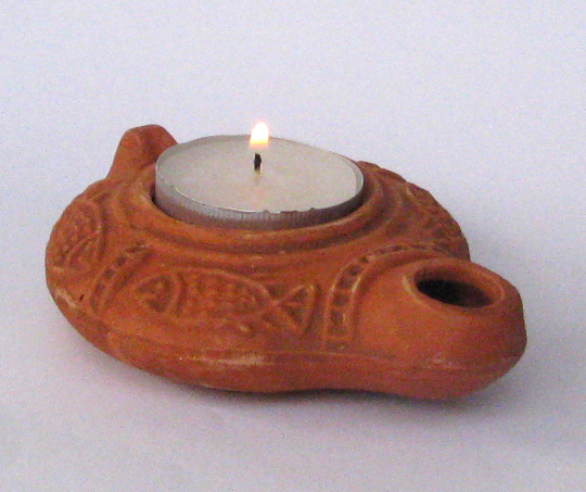 An authentic reproduction of the common housely oil lamp, first century.